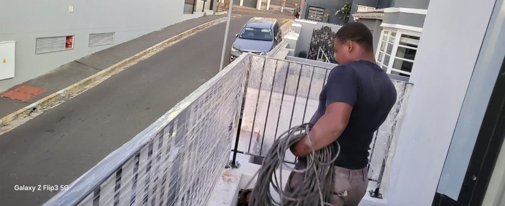 Supar Steel technician working on-site during a steel and cable installation project in Cape Town
